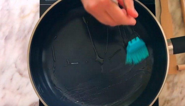 lubricate the preheated pan with butter.