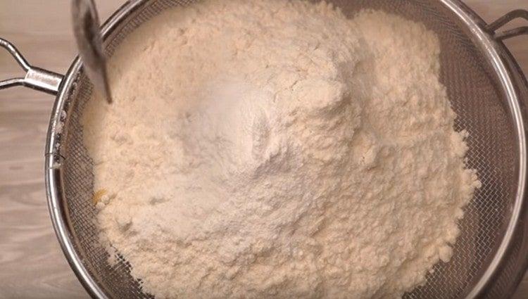 Mix flour with baking powder and sift.