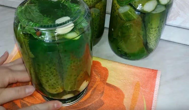 Turn the cans upside down.