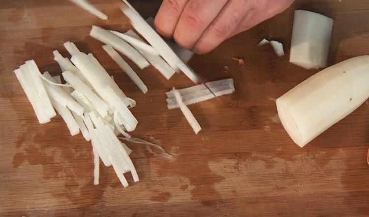 Cut into strips radish.