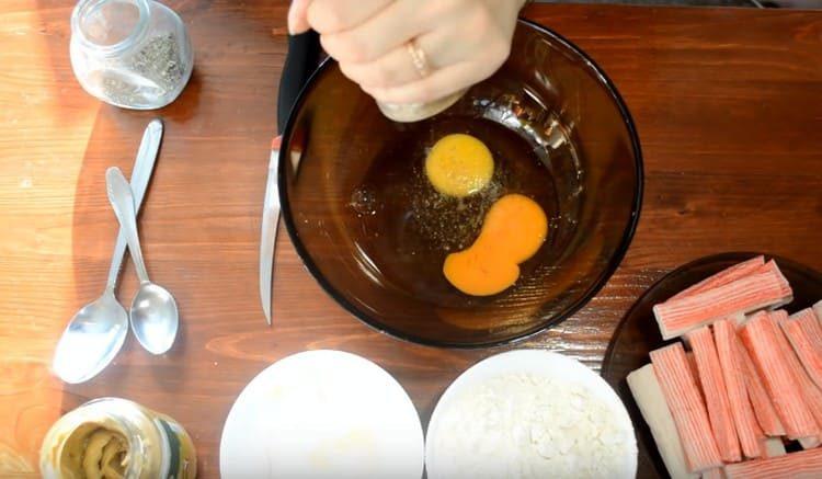 We beat the batter in a bowl and add salt, spices, mustard.