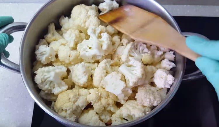 Add all prepared vegetables to the onion.