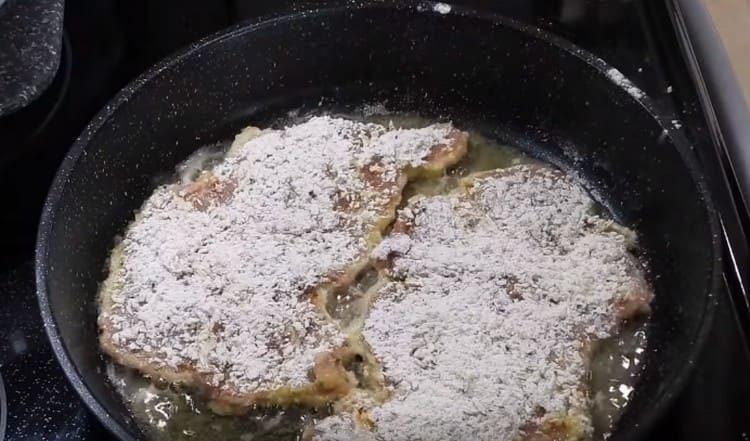 Dip the meat in an egg, then in a breading and spread in a pan.