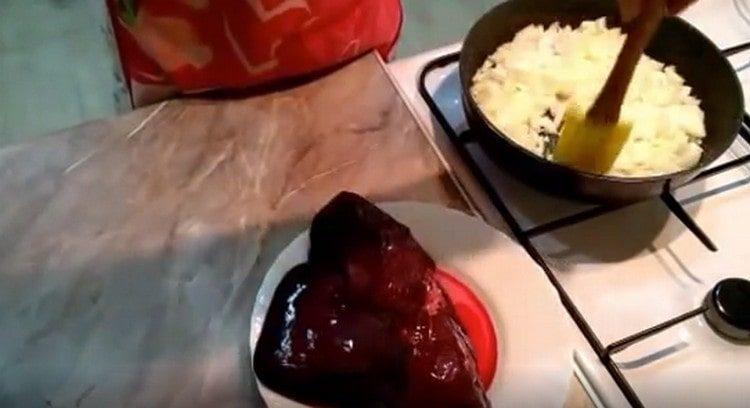 Fry the onion until golden brown.