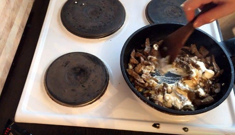 Add sour cream, mix well.