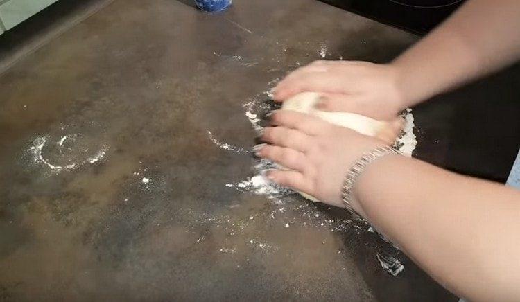 Knead the dough again.