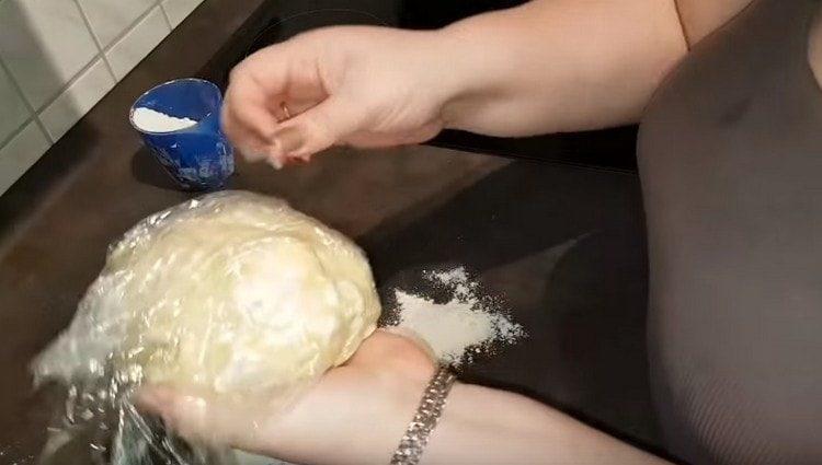 We collect the dough in a com and send it to the refrigerator.