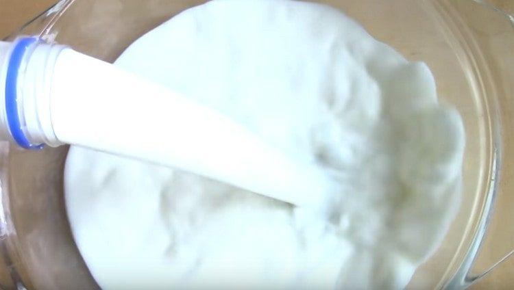 Pour milk into the baking dish.