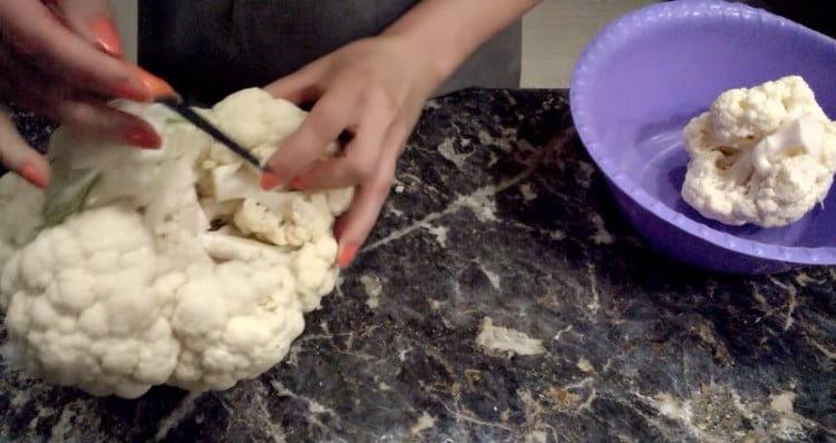 Head of cauliflower cut into inflorescences.