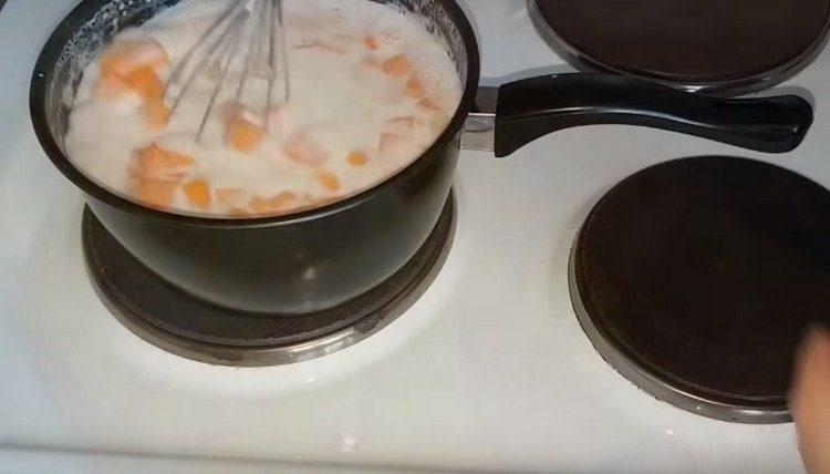 put the pumpkin in boiling milk, add salt and sugar.