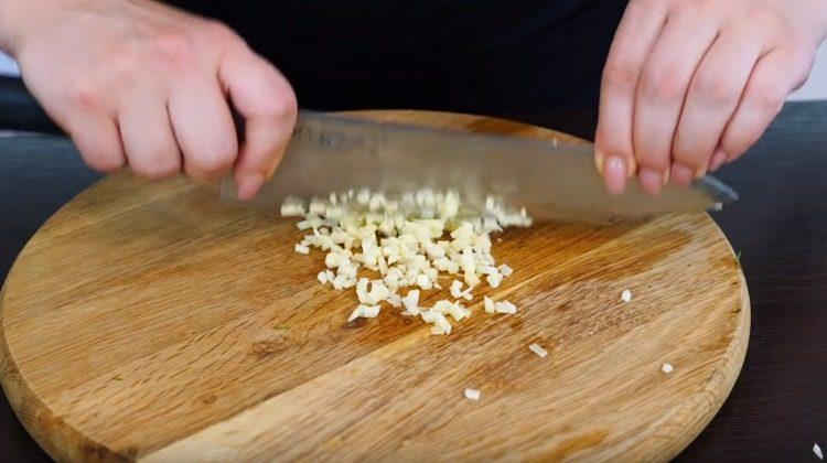 Finely chop the garlic.