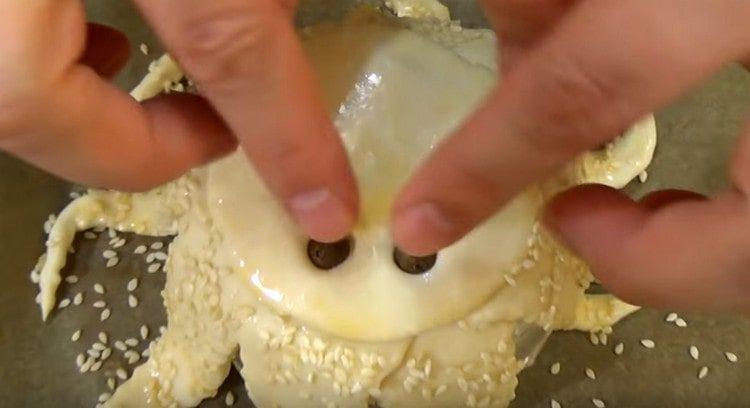 From peppercorns we form an octopus eyes.