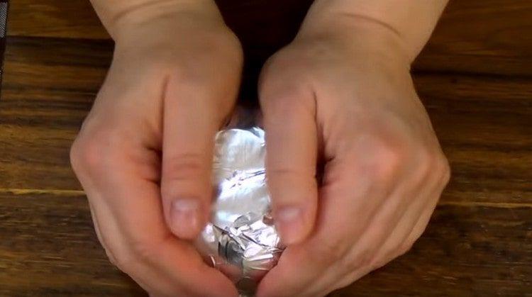 Wrap the ceramic cup with foil.