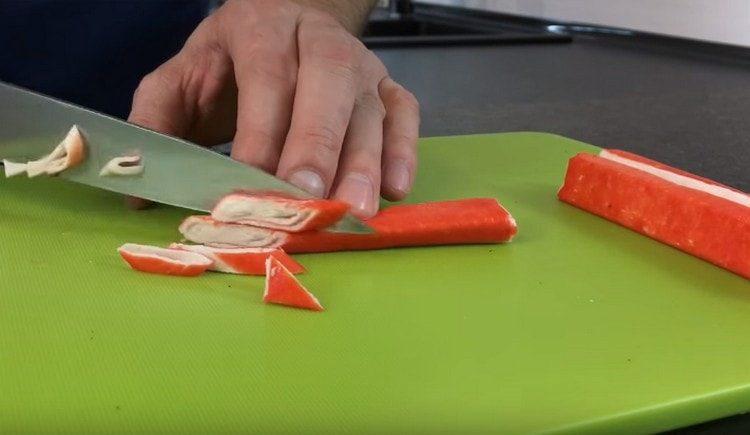 Cut the crab sticks.