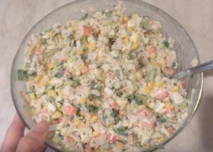 We prepare a gentle salad with crab sticks and rice according to a step-by-step recipe with a photo.