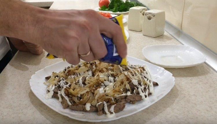 Next, spread the onions, again a little mayonnaise.