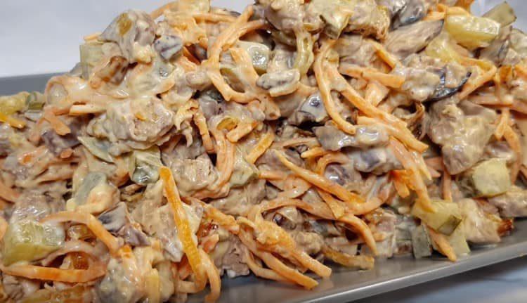 such a salad with chicken liver and Korean carrots seasoned with mayonnaise.