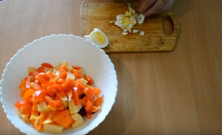 Cut the boiled eggs.