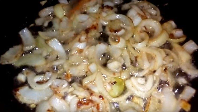 Fry the onion until golden brown.