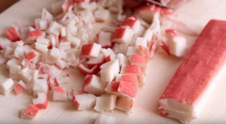 Cut the crab sticks.