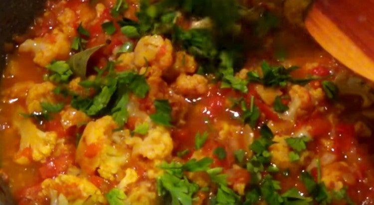 Add salt, pepper, garlic, as well as chopped herbs.