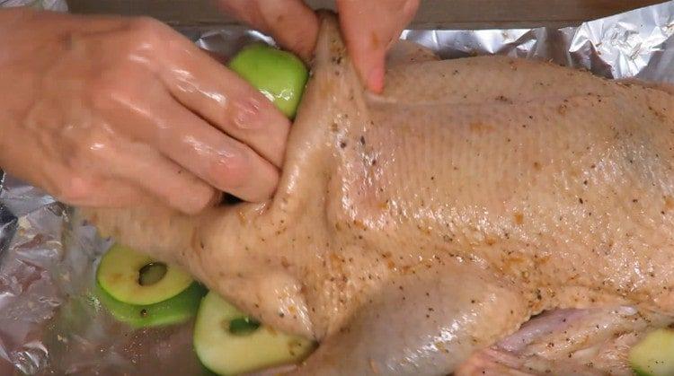 Stuff the duck with apples.