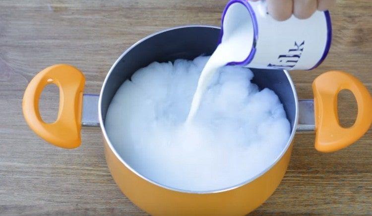 Combine water with milk, add salt, bay leaf and bring to a boil.