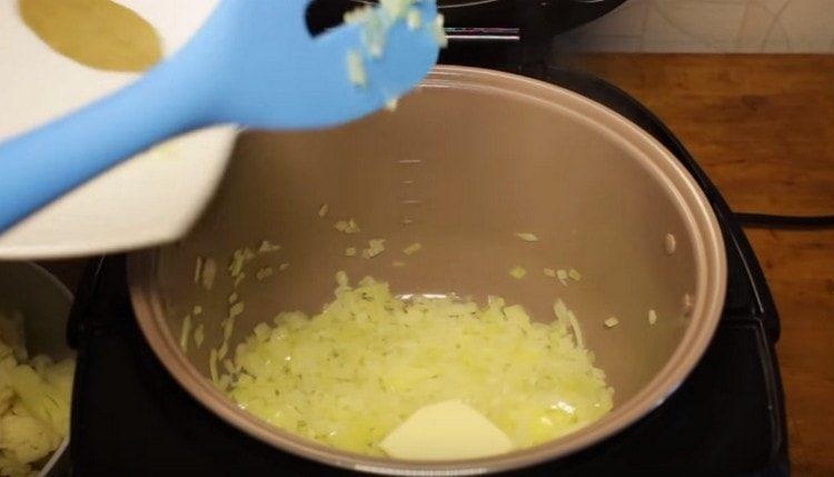 Add a piece of butter to the onion.