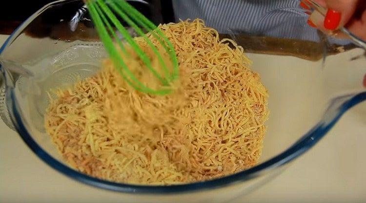 Add paprika, dried garlic and mix the breading.