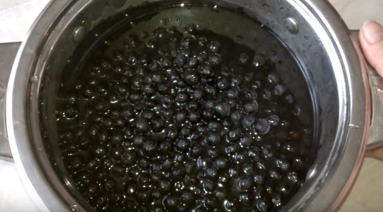 Pour the berries with boiling water, then drain it.