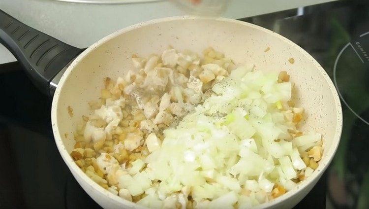 Salt and pepper the contents of the pan.