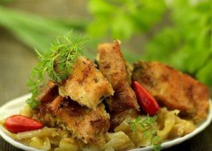 Cooking a juicy barbecue in the oven on an onion pillow: an interesting step by step recipe with a photo.