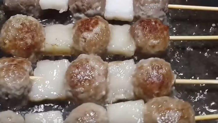 Fry the kebabs in the new oil until golden brown.