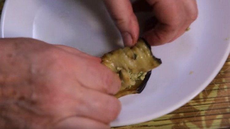 Twist the eggplant roll.