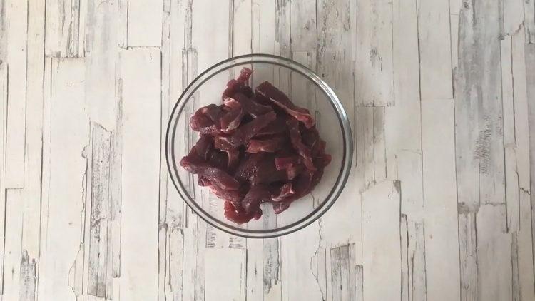 Cooking beef stroganoff with mushrooms