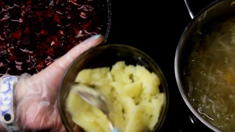 Mash potatoes to cook