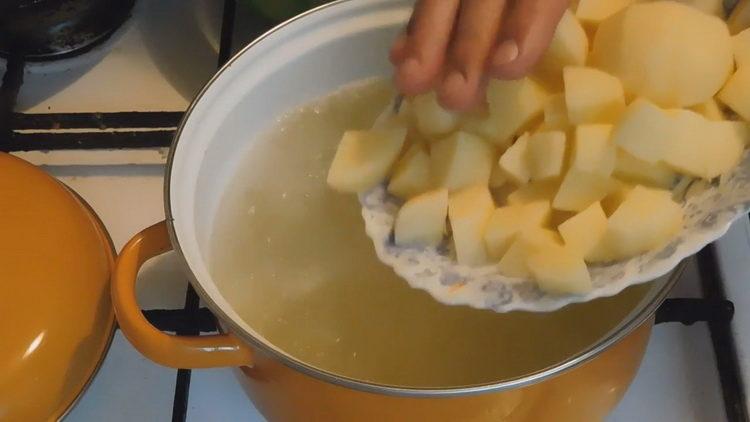 Boil potatoes for cooking