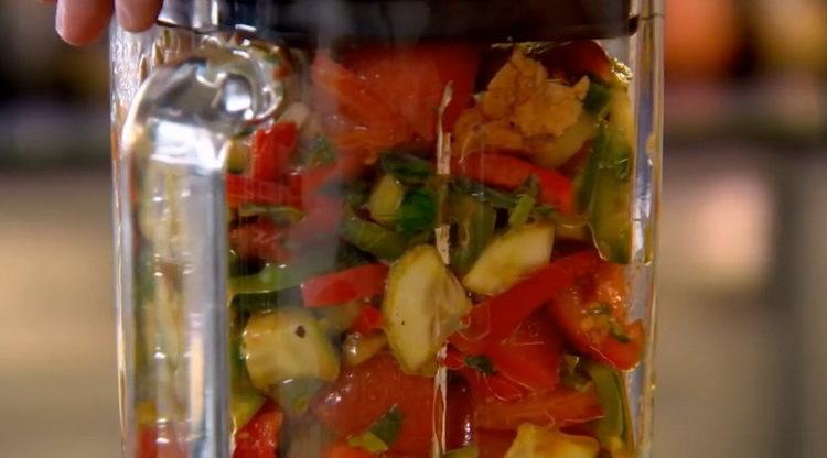 Place a blender in a bowl to prepare a meal