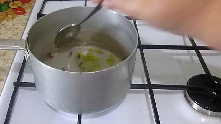 boil water in a saucepan until sugar dissolves