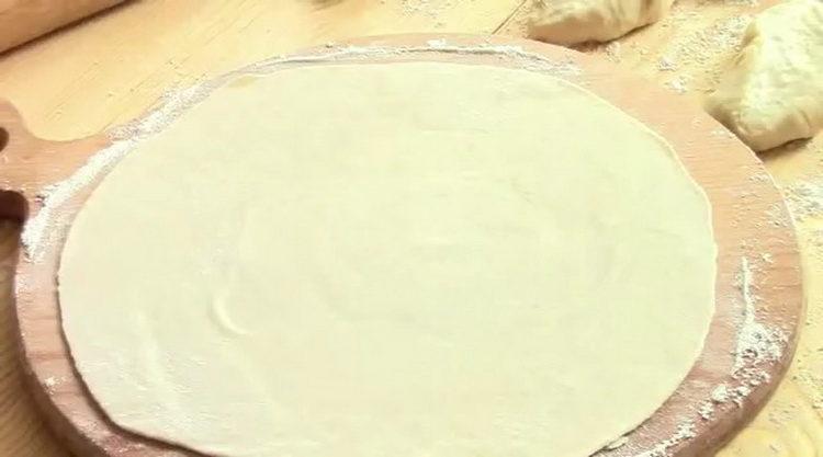 Roll out the dough to cook