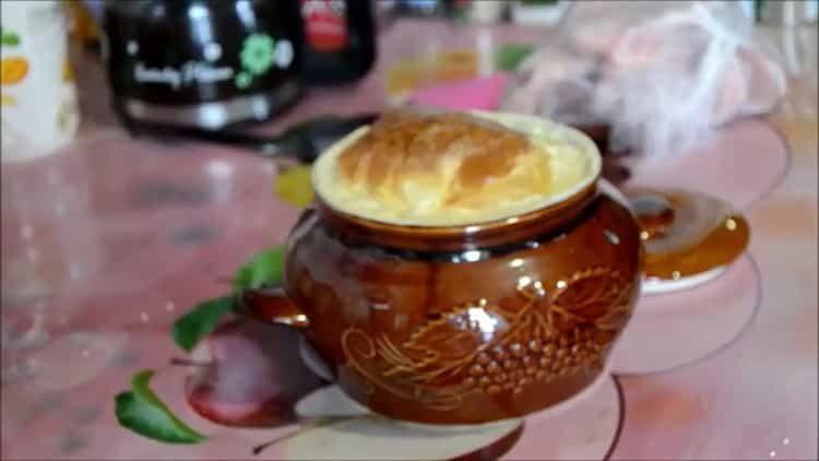 millet porridge in a pot in the oven is ready