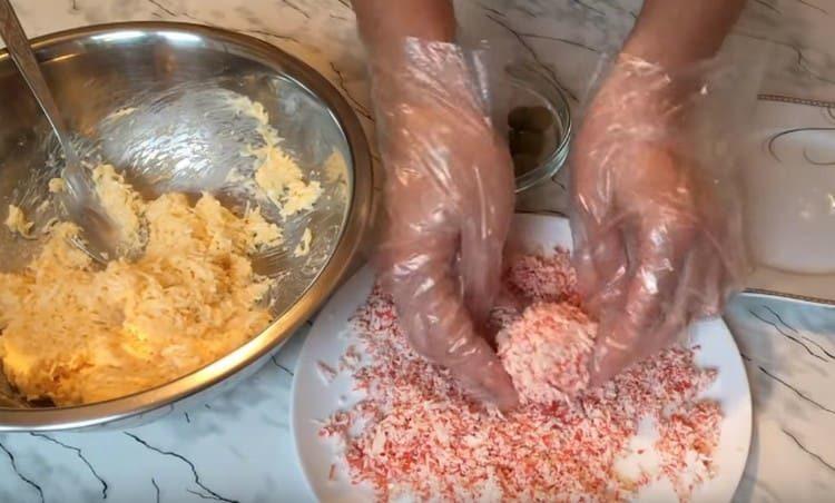 Roll the ball in crab sticks.