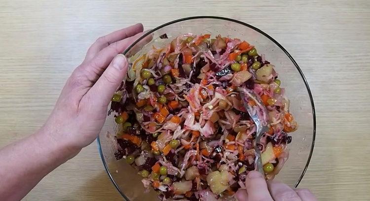 Mix the ingredients to make a salad.