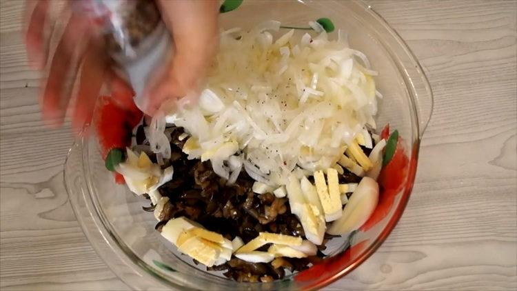 Mix the ingredients to make a salad.