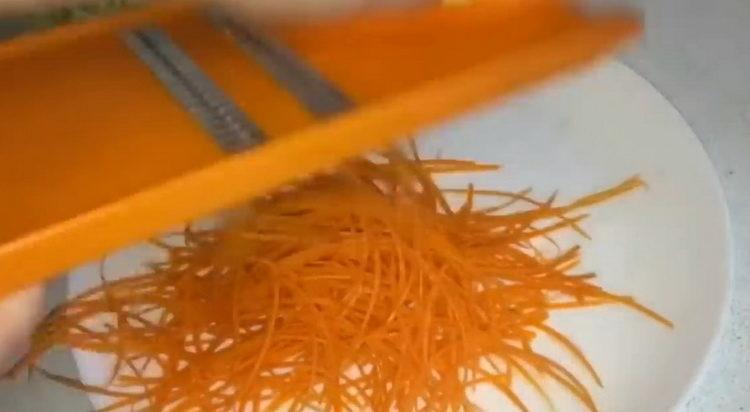 Grate carrots for cooking