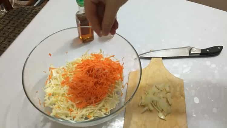 Cooking cabbage salad with carrots
