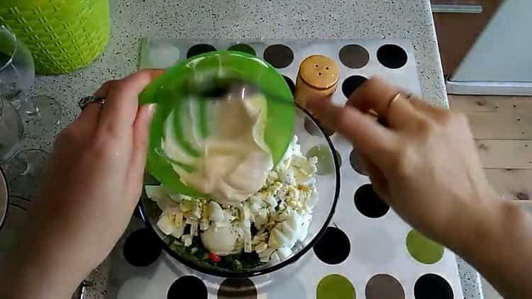 salad with korean carrots and crab sticks ready