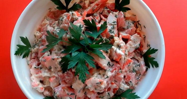salad with crab sticks and tomatoes ready