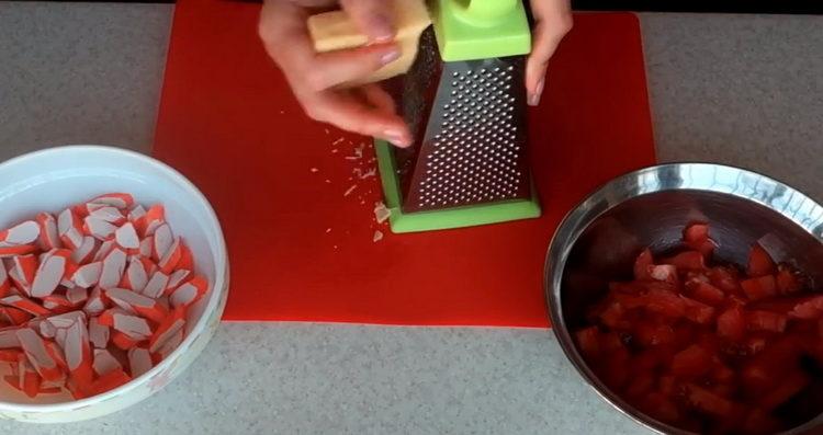 Grate cheese to cook