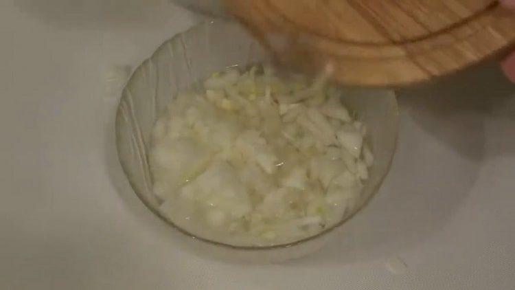 Pickle the onions to prepare the meal.